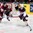 MINSK, BELARUS - MAY 15: USA's John Gaudreau #53 plays the puck while Latvia's Herberts Vasiljevs #12 defends during preliminary round action at the 2014 IIHF Ice Hockey World Championship. (Photo by Andre Ringuette/HHOF-IIHF Images)

